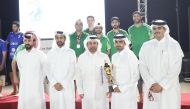 Katara General Manager, Prof. Dr. Khalid bin Ibrahim Al Sulaiti (front row, centre) with other officials and winners during the closing ceremony of the Beach Volleyball Championship.