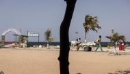 Senegal daily life; Men transport building materials on a cart on Goree Island, on March 29, 2024. Photo by MARCO LONGARI / AFP.