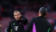 Bayern Munich's English striker #09 Harry Kane warms up prior to the UEFA Champions League quarter final first-leg football match between Arsenal and Bayern Munich at the Arsenal Stadium, in north London, on April 9, 2024. (Photo by Adrian DENNIS / AFP)