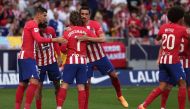 Atletico Madrid's French forward #07 Antoine Griezmann celebrates scoring his team's third goal during the Spanish league football match between Club Atletico de Madrid and Girona FC at the Metropolitano stadium in Madrid on April 13, 2024. (Photo by Thomas COEX / AFP)
