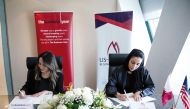 Country Director for The Business Year in Qatar Vanessa Rameix and Managing Director of USQBC’s office in Doha Sheikha Mayes bin Hamad Al Thani during the MoU signing ceremony.