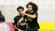 Al Sadd’s Akram Afif (right) celebrates with Yousuf Abdurisag. 