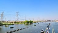 Cars are stranded on a flooded al-Khalil road in the al-Barsha area in Dubai following heavy rains on April 18, 2024. Photo by Giuseppe CACACE / AFP