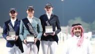 Longines Hathab Deputy Director Faisal Al Kahla poses with the podium winners of Big Tour. 