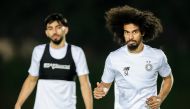 Al Sadd’s Akram Afif (right) and Tarek Salman attend team’s training session yesterday.