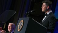 US President Joe Biden laughs as US comedian Colin Jost (R) speaks during the White House Correspondents' Association (WHCA) dinner at the Washington Hilton, in Washington, DC, on April 27, 2024. (Photo by Brendan Smialowski / AFP)