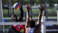 Qatar's Cherif Younousse (left) in action during the Volleyball World Beach Pro Tour Brasília Elite16. 