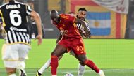 Roma's Belgian forward #90 Romelu Lukaku (C) fights for the ball with Juventus' Brazilian defender #03 Bremer during the Italian Serie A football match between Roma and Juventus at the Olympic stadium, in Rome on May 5, 2024. (Photo by Andreas SOLARO / AFP)
