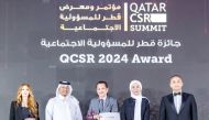 CEO of Qatar CSR National Programme Dr. Saif Ali Al Hajari (second left), Regional Director of LuLu Hypermarket Qatar Shaijan M.O. (centre) with other officials at the awards ceremony.  