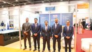 Officials pose for a group photo at the UK’s largest overseas property exhibition. 