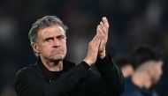 Paris Saint-Germain's Spanish headcoach Luis Enrique applauds the fans at the end of the UEFA Champions League semi-final second leg football match between Paris Saint-Germain (PSG) and Borussia Dortmund, at the Parc des Princes stadium in Paris on May 7, 2024. (Photo by MIGUEL MEDINA / AFP)
