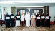 Minister of Environment and Climate Change H E Dr. Abdullah bin Abdulaziz bin Turki Al Subaie with winners of 2024 environmental drawing and essay competition.