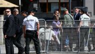 Picture taken on May 15, 2024 shows security personnel apprehending a suspected gunman (C/GROUND) after Slovakia's Prime Minister was shot in Handlova, Slovakia on May 15, 2024. Photo by AFP
