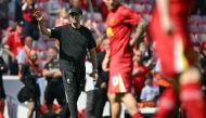 Liverpool's German manager Jurgen Klopp waves to fans as he checks out the conditions ahead of the English Premier League football match between Liverpool and Wolverhampton Wanderers at Anfield in Liverpool, north west England on May 19, 2024. Photo by Paul ELLIS / AFP