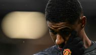 Manchester United's English striker #10 Marcus Rashford reacts during the warm up prior to the English Premier League football match between Manchester United and Newcastle United at Old Trafford in Manchester, north west England, on May 15, 2024. (Photo by Oli SCARFF / AFP)