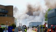 Firemen work to extinguish a fire that broke out at the headquarters of Danish multinational pharmaceutical company Novo Nordisk in Bagsvaerd near Copenhagen, Denmark, on May 22, 2024. Photo by Liselotte Sabroe / Ritzau Scanpix / AFP