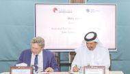 QC First Vice-Chairman Mohamed bin Twar Al Kuwari and Lyall Gorman, Vice President of the ACCI, signing the agreement.
