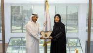 Yousuf Abdulla Fakhroo, Chief Marketing and Corporate Communications Officer, QFC and Eman Al Amri, Director of Al Jazeera Media Institute, during the signing ceremony.