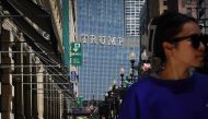 People walk downtown near the Trump International Hotel & Tower on May 30, 2024 in Chicago, Illinois. Scott Olson/Getty Images/AFP 