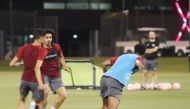 Qatar players during an open training session at Aspire training pitch yesterday.