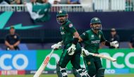 (L-R) Pakistan's captain Babar Azam and Pakistan's Mohammad Rizwan run between the wickets during the ICC men's Twenty20 World Cup 2024 group A cricket match between Pakistan and Canada at Nassau County International Cricket Stadium in East Meadow, New York on June 11, 2024. (Photo by Timothy A. Clary / AFP)

