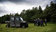 Members of the public take part in a guided tour to see beavers by a pond near Doune, Perthshire, Scotland, on June 16, 2024. (Photo by Andy Buchanan / AFP)
