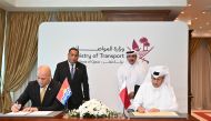 Minister of Transport H E Jassim Saif Ahmed Al Sulaiti and Minister of Information, Communication, and Transport of Kiribati H E Tekeeua Tarati witnessing the agreement signing in Doha, yesterday.