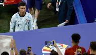 Portugal's forward #07 Cristiano Ronaldo leaves the pitch after the UEFA Euro 2024 Group F football match between Georgia and Portugal at the Arena AufSchalke in Gelsenkirchen on June 26, 2024. (Photo by Kenzo Tribouillard / AFP)