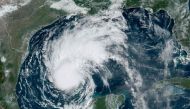 This National Oceanic and Atmospheric Administration (NOAA)/GOES satellite handout image shows Tropical Storm Beryl at 14:56 UTC on July 6, 2024, in the Gulf of Mexico. (Photo by Handout / NOAA/GOES / AFP) 