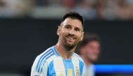 Lionel Messi of Argentina smiles during the CONMEBOL Copa America 2024 semifinal match at MetLife Stadium on July 09, 2024. Elsa/Getty Images/AFP 