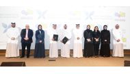 Chairman of  Qatar Cancer Society Sheikh Dr. Khalid bin Jabor Al Thani (fourth left) and CEO of Qatar Museums Mohammed Saad Al Rumaihi (fifth left) with other officials during the MoU signing ceremony. 