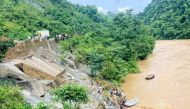 Rescuers search for survivors in river Trishuli in Simaltar on July 12, 2024, at the site of a landslide. (Photo by Rajesh Ghimire / AFP)
