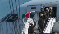 File: Kenyan security forces arrive at Toussaint Louverture International Airport in Port-au-Prince on June 25, 2024. (Photo by Clarens Siffroy / AFP)