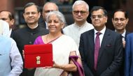 India's Finance Minister Nirmala Sitharaman (C) poses for photos before presenting the union budget in the Parliament in New Delhi on July 23, 2024. (Photo by Sajjad Hussain / AFP)
