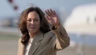 US Vice President and Democratic presidential candidate Kamala Harris waves as she returns to Joint Base Andrews in Maryland after attending a campaign fundraising event in Massachusetts on July 27, 2024. (Photo by Stephanie Scarbrough / POOL / AFP)
