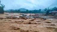 A handout photograph taken on July 30, 2024 shows a damaged car at the landslide site in Wayanad. (All photos by National Disaster Response Force (NDRF) / AFP)