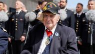 (FILES) French WWII veteran Jacques Levis, who landed on Utah beach on D-Day alongside US troops, waits for the arrival of US President ahead of a ceremony as part of his state visit to France, at the Arc de Triomphe in Paris on June 8, 2024. (Photo by Ludovic MARIN / POOL / AFP)

