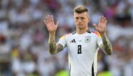 (Files) Germany's midfielder #08 Toni Kroos greets the fans after the UEFA Euro 2024 quarter-final football match between Spain and Germany on July 5, 2024. (Photo by Thomas Kienzle / AFP)