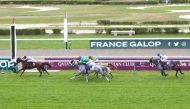 Jockey Christophe Soumillon (left) guides Nour Al Maury towards victory in the Gr.1 (PA) Doha Cup - Prix Manganate at Deauville, France.