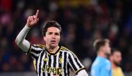 (FILES) Juventus' Italian forward #07 Federico Chiesa celebrates after scoring a penalty during the Italian Serie A football match between Genoa and Juventus at the Luigi Ferraris stadium, on December 15, 2023. (Photo by Marco BERTORELLO / AFP)
