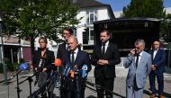 North Rhine-Westphalia's vice state premier Mona Neubaur, North Rhine-Westphalia's State Premier Hendrik Wuest, German Chancellor Olaf Scholz, Solingen's mayor Tim Kurzbach and North Rhine-Westphalia's Interior Minister Herbert Reul speak to the media at the site of a knife attack in Solingen, western Germany, on August 26, 2024. Photo by INA FASSBENDER / AFP.