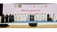 Officials in a group photo at the forum in Doha yesterday.