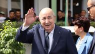 A handout picture released by the Algerian Presidency Facebook page, shows Algeria's incumbent President Abdelmadjid Tebboune leaving a polling station after voting in Algiers on September 7, 2024. Photo by ALGERIAN PRESIDENCY FACEBOOK PAGE / AFP.