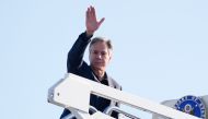 US Secretary of State Antony Blinken waves as he boards a plane at Joint Base Andrews, in Maryland, on September 9, 2024. (Photo by Mark Schiefelbein / POOL AP / AFP)

