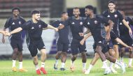 Qatar players during a training session on the eve of the FIFA World Cup 2026 Asian Qualifier against North Korea in Vientiane, Laos.