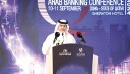 QCB Governor H E Sheikh Bandar bin Mohammed bin Saoud Al Thani speaking during the inauguration of the Arab Banking Conference 2024, yesterday.