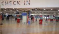 Empty check-in counters seen inside the departures of the Jomo Kenyatta International Airport (JKIA) in Nairobi on September 11, 2024 amid a strike by the Kenyan Aviation Workers Union. Photo by SIMON MAINA / AFP