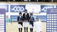 Qatar Equestrian Federation (QEF) President Badr Al Darwish poses for a photo with the podium winners in the Future Riders 80cm class, Abdulla Khalifa Al Suwaidi (second left), Ahmed Mahmoud Alarrouqi (left), and Mohammed Salem Al Naemi (third left). 