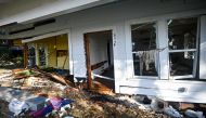A house destroyed by Hurricane Helene after making landfall is seen in Cedar Key, Florida, on September 27, 2024.  (Photo by Miguel J. Rodriguez Carrillo / AFP)

