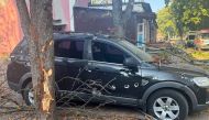 This handout photograph taken and released by the National Police of Ukraine on September 28, 2024, shows a damaged car in the courtyard of a hospital following a drone attack in Sumy. (Photo by Handout / National Police of Ukraine / AFP)
